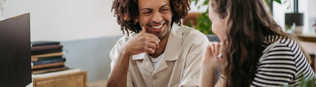 Young colleagues working together in a startup company.